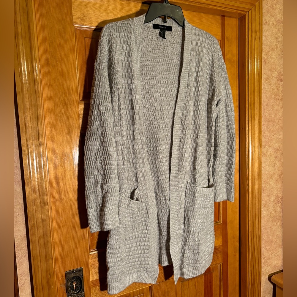 Light gray sweater cardigan from f21 but feels like a dream long covers the butt